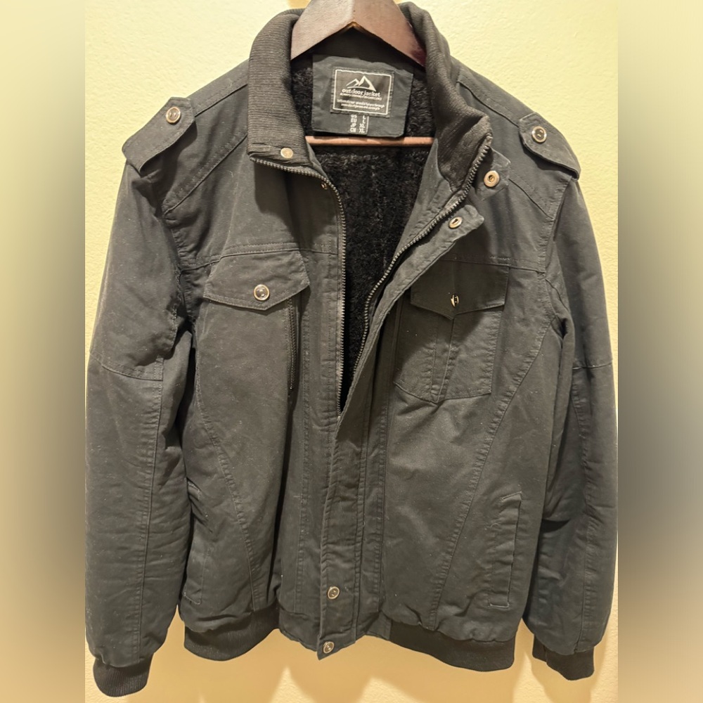 Outdoor Jacket Black with furry interior. Great for colder weather.